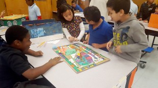 Students play a student created board game